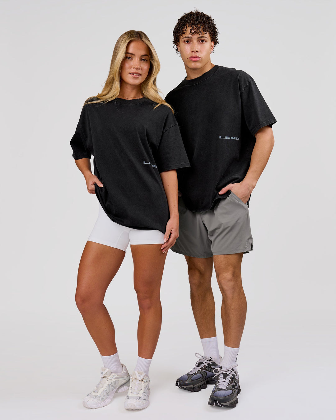 Woman wearing Backline Washed Heavyweight Oversized Tee - Black Washed | Model:Issy | Size:XS - view 9