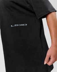 Woman wearing Backline Washed Heavyweight Oversized Tee - Black Washed | Model:Issy | Size:XS | Thumbnail Index: 14