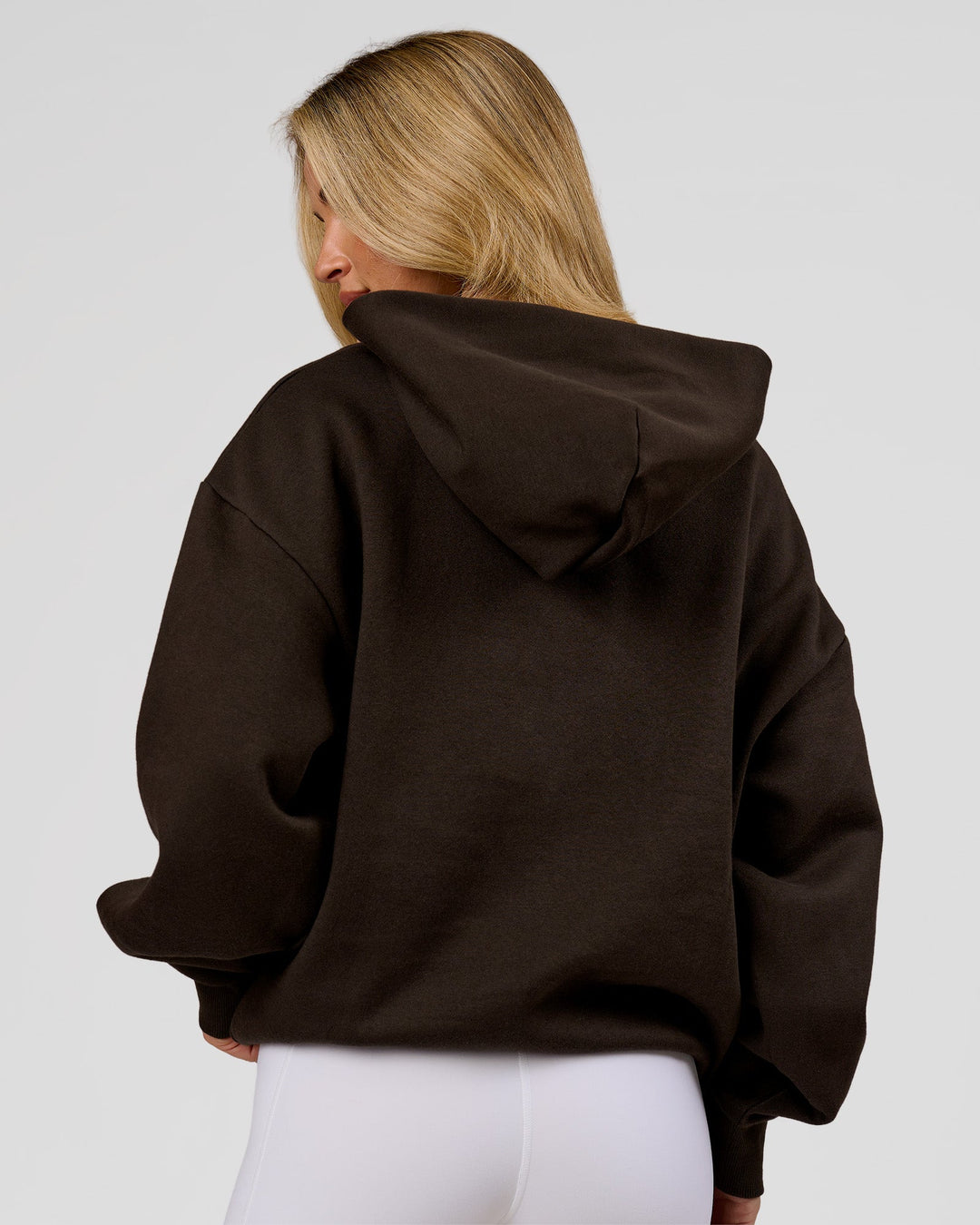 Woman wearing Base Oversized Hoodie - Ground Coffee | Model:Issy | Size:XS - view 11