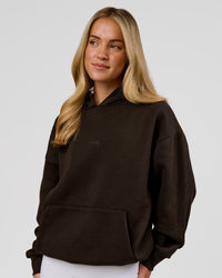 Woman wearing Base Oversized Hoodie - Ground Coffee | Model:Issy | Size:XS | Thumbnail Index: 11
