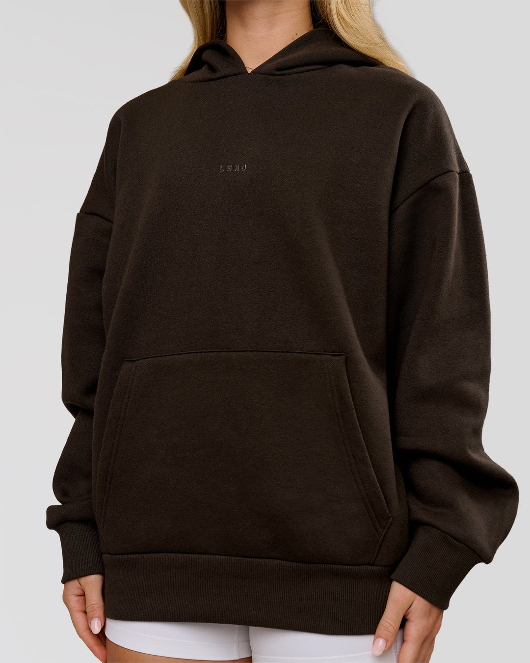 Woman wearing Base Oversized Hoodie - Ground Coffee | Model:Issy | Size:XS - view 14