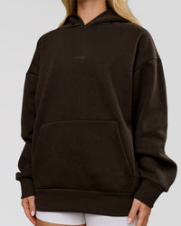 Woman wearing Base Oversized Hoodie - Ground Coffee | Model:Issy | Size:XS | Thumbnail Index: 13