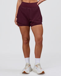 Woman wearing Challenger 3" Lined Performance Short - Cherry Lacquer | Model:Issy | Size:XS | Thumbnail Index: 2