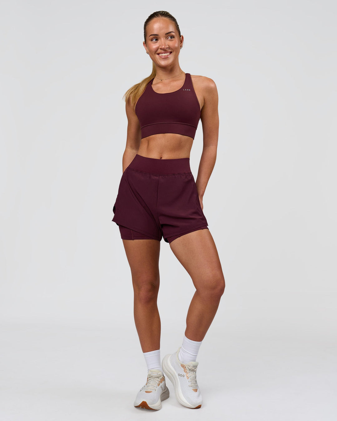Woman wearing Challenger 3" Lined Performance Short - Cherry Lacquer | Model:Issy | Size:XS - view 7