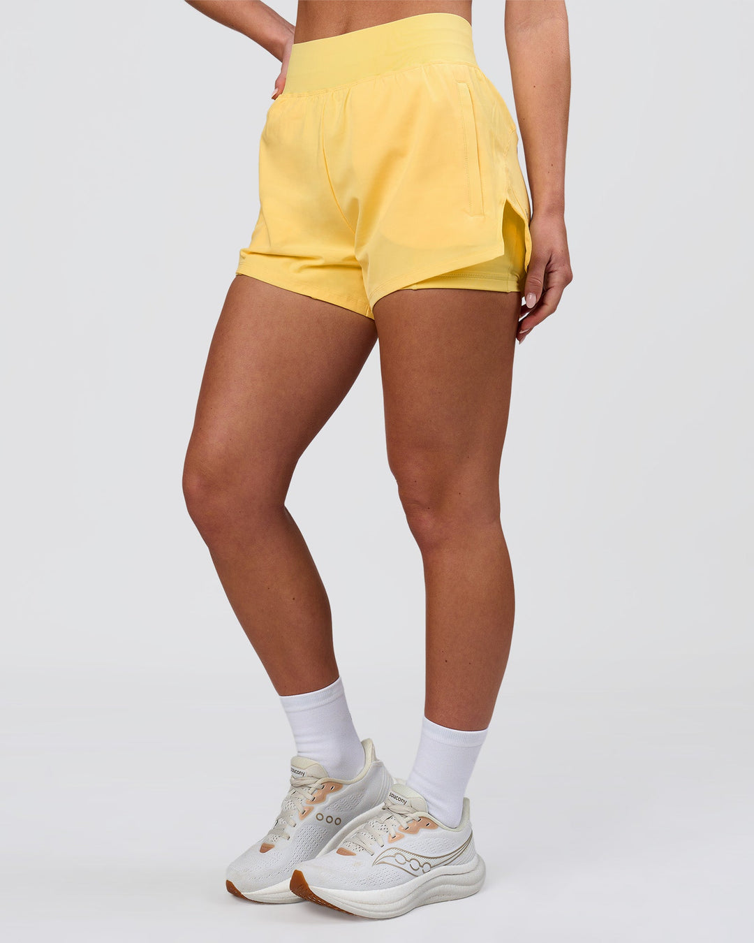 Woman wearing Challenger 3" Lined Performance Short - Lemon | Model:Issy | Size:XS - view 7