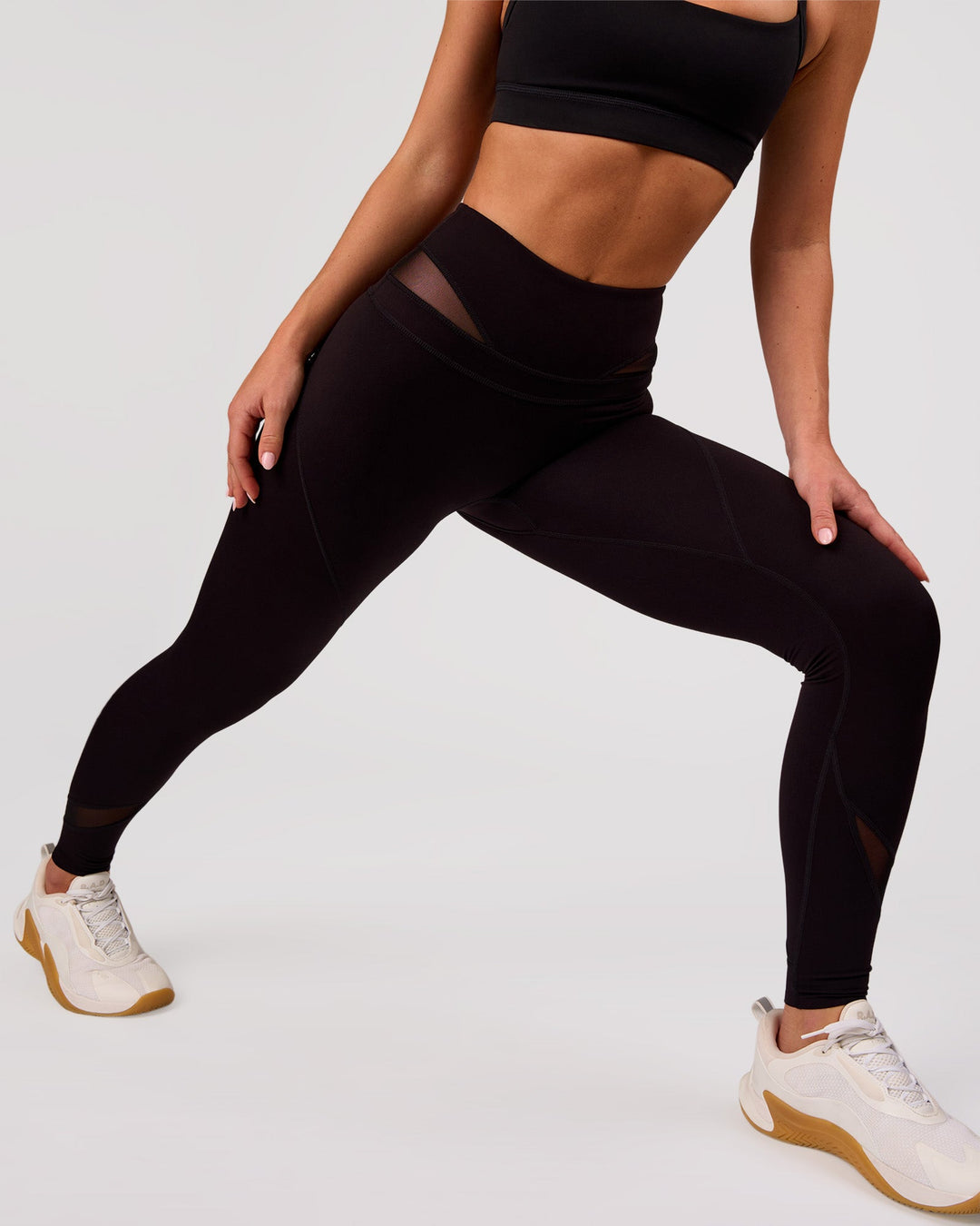 Woman wearing Dare High-Rise Full Length Legging - Black | Model:Issy | Size:XS - view 2
