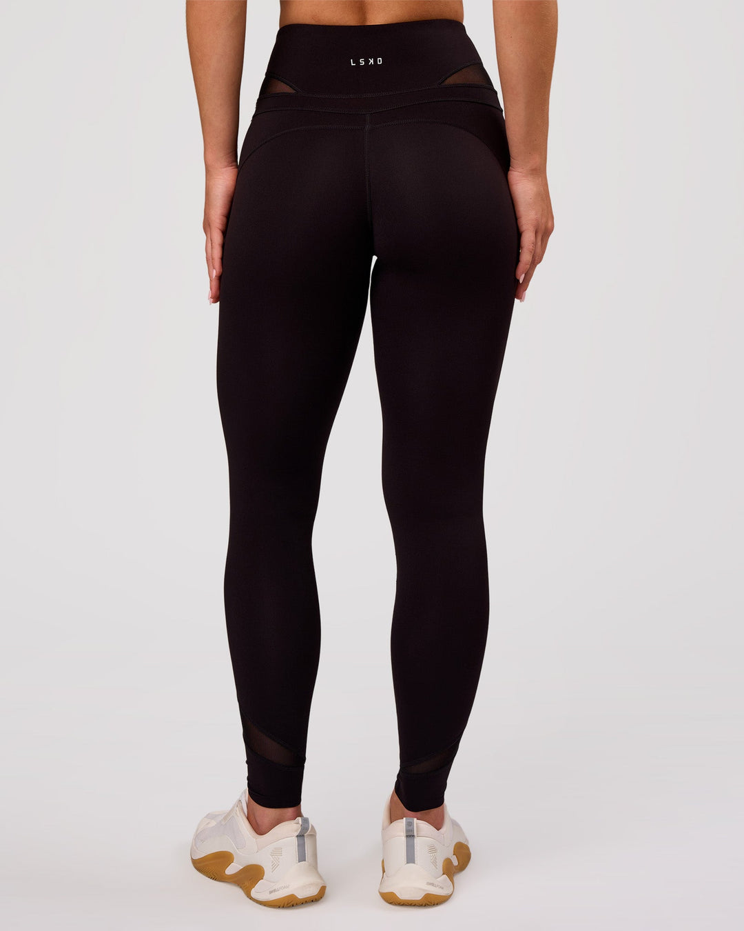 Woman wearing Dare High-Rise Full Length Legging - Black | Model:Issy | Size:XS - view 7