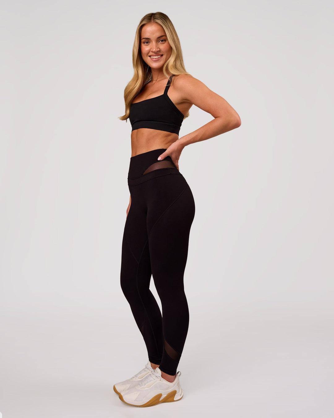 Woman wearing Dare High-Rise Full Length Legging - Black | Model:Issy | Size:XS - view 10