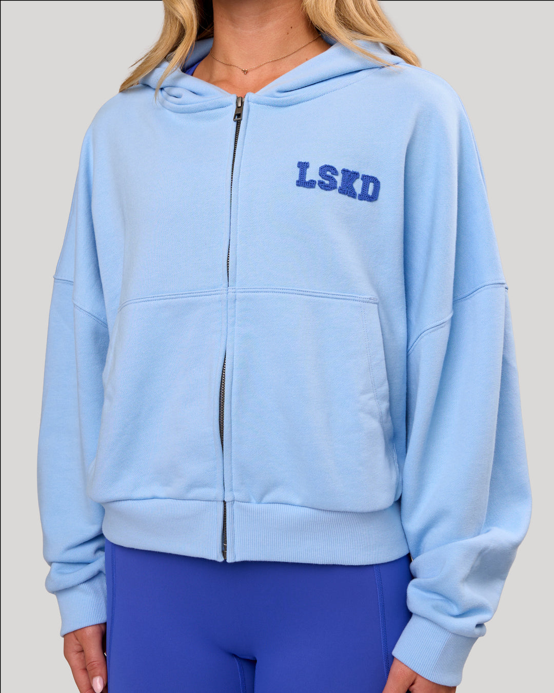 Woman wearing Distress French Terry Full Zip Hoodie - Open Air | Model: Issy | Size: XS - view 1
