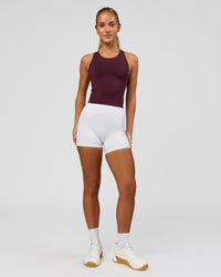 Woman wearing Flow Performance Tank 2.0 - Cherry Lacquer | Model:Issy | Size:XS | Thumbnail Index: 4