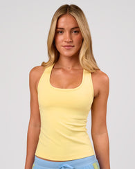 Woman wearing Flow Rep Scoop Neck Tank - Lemon | Model:Issy | Size:XS