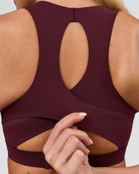 Woman wearing Fusion Sports Bra 2.0 - Cherry Lacquer | Model:Issy | Size:XS | Thumbnail Index: 4