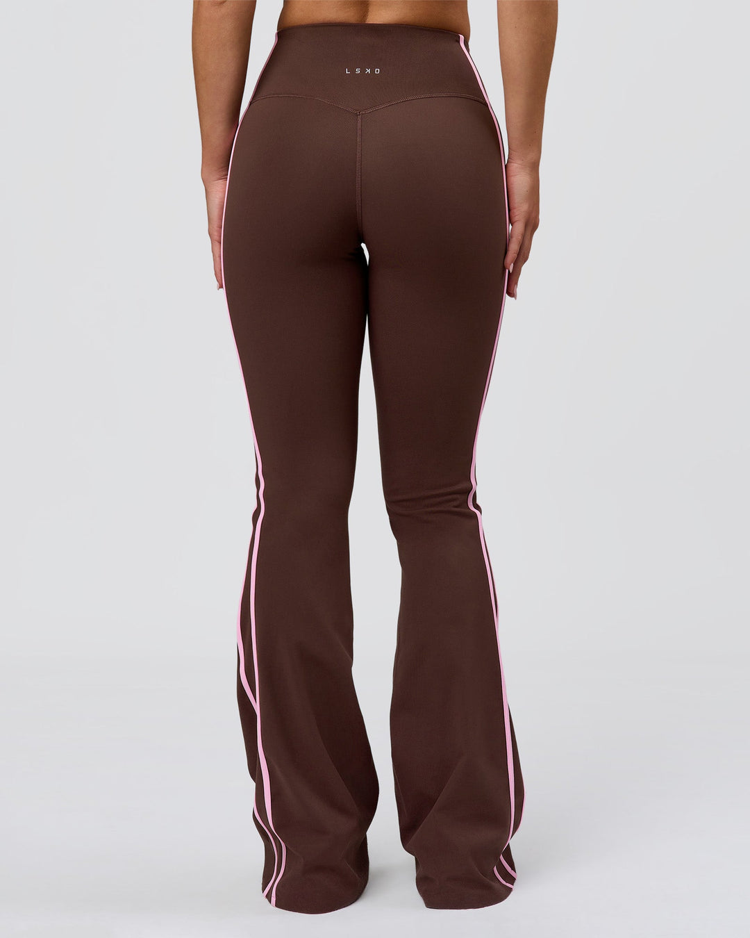 Woman wearing Fusion V-Contour Bind High-Rise Flared Legging - Hot Chocolate-Pink Rose | Model:Issy | Size:XS - view 12