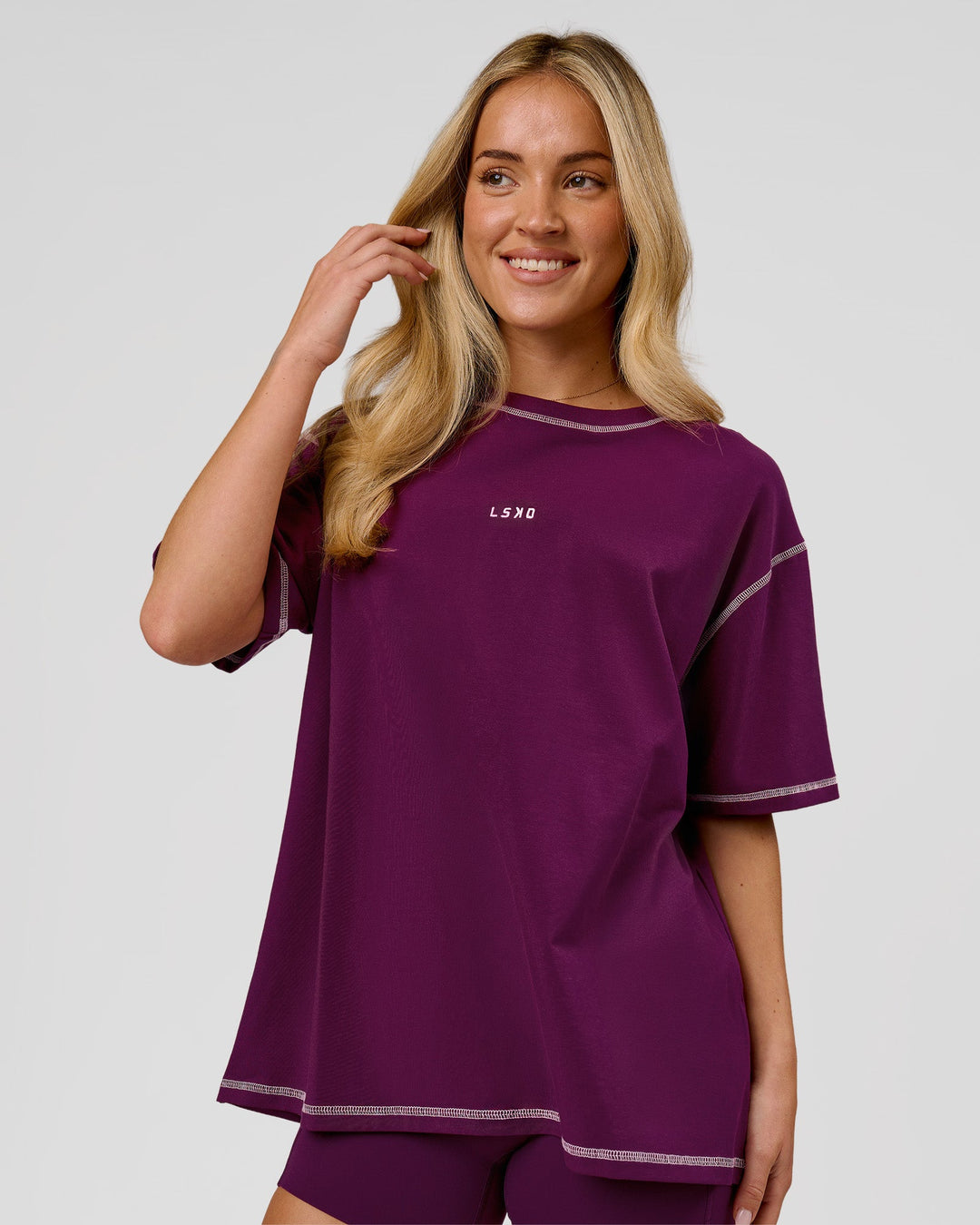 Woman wearing Go-To Contrast Oversized Heavyweight FLXCotton Tee - Plum Caspia-Pink Rose | Model:Issy | Size:XS - view 1