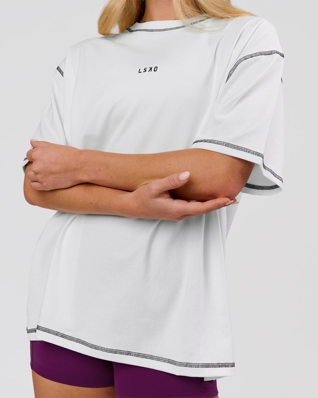 Woman wearing Go-To Contrast Oversized Heavyweight FLXCotton Tee - White-Black | Model:Issy | Size:XS - view 8
