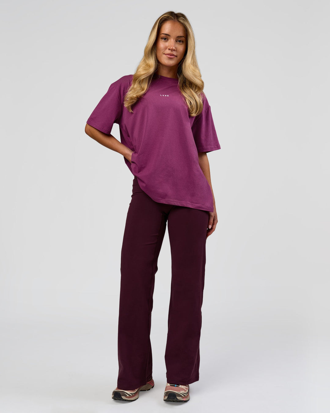Woman wearing Go-To FLXCotton Oversized Tee - Boysenberry-White | Model:Issy | Size:XS - view 2
