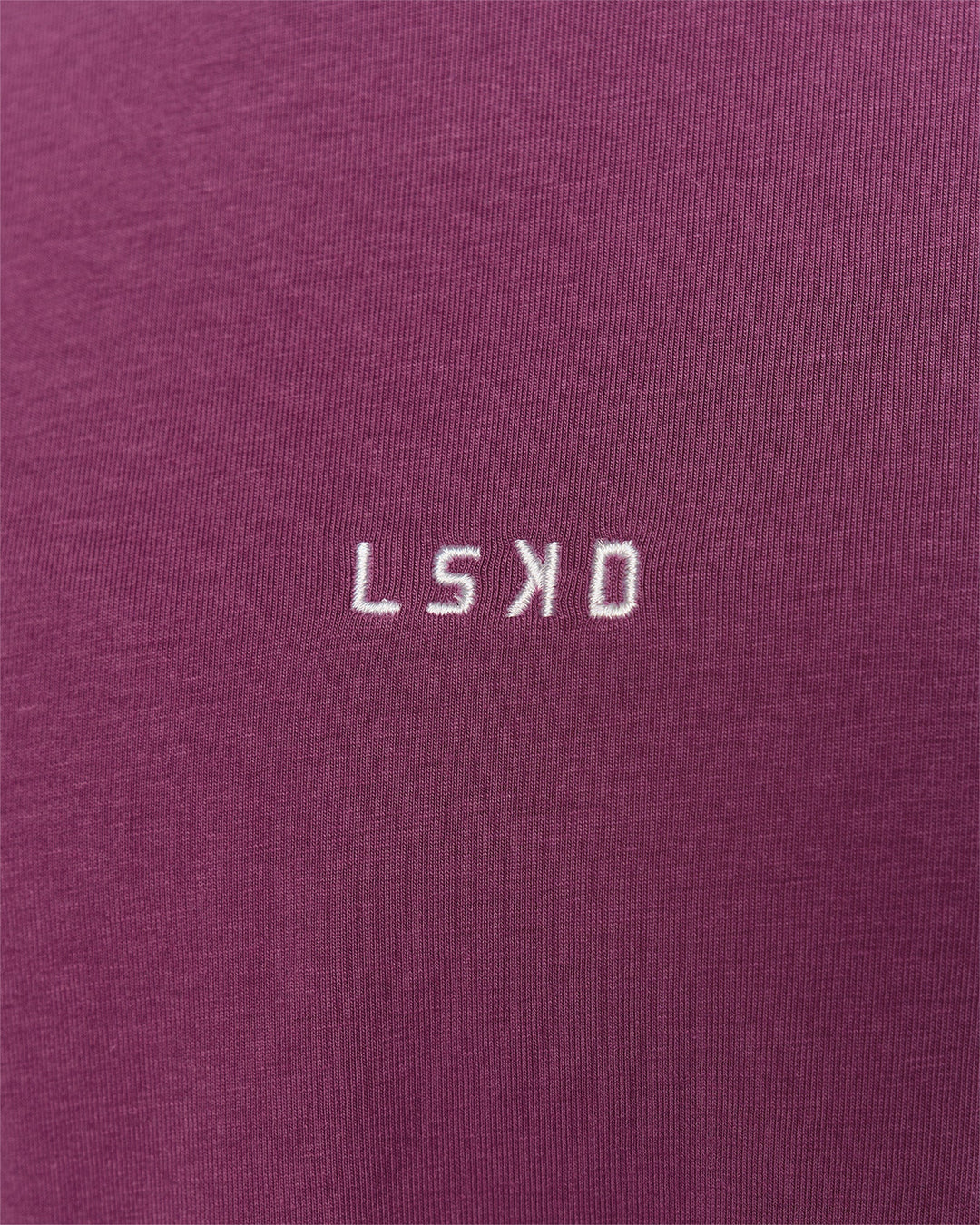 Woman wearing Go-To FLXCotton Oversized Tee - Boysenberry-White | Model:Issy | Size:XS - view 4