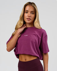 Woman wearing Go-To FLXCotton Oversized Tee - Boysenberry-White | Model:Issy | Size:XS | Thumbnail Index: 5