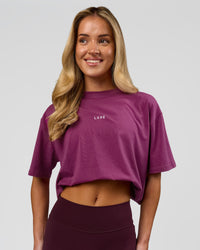 Woman wearing Go-To FLXCotton Oversized Tee - Boysenberry-White | Model:Issy | Size:XS | Thumbnail Index: 6