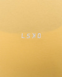 Woman wearing Go-To FLXCotton Oversized Tee - Lemon-White | Model:Issy | Size:XS | Thumbnail Index: 3