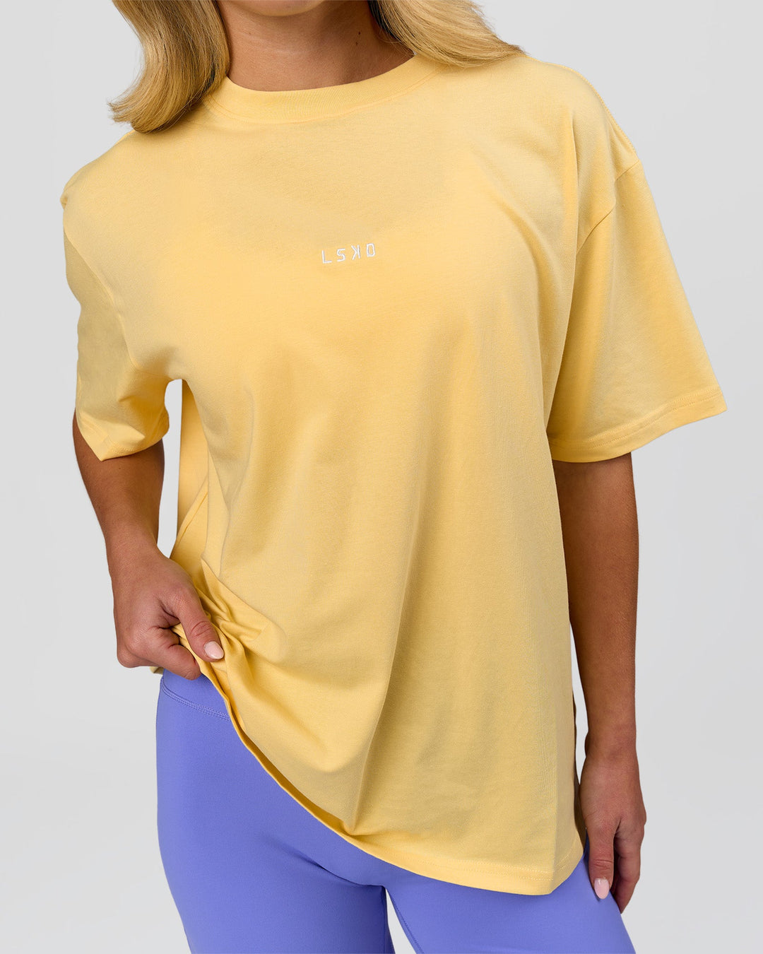 Woman wearing Go-To FLXCotton Oversized Tee - Lemon-White | Model:Issy | Size:XS - view 5