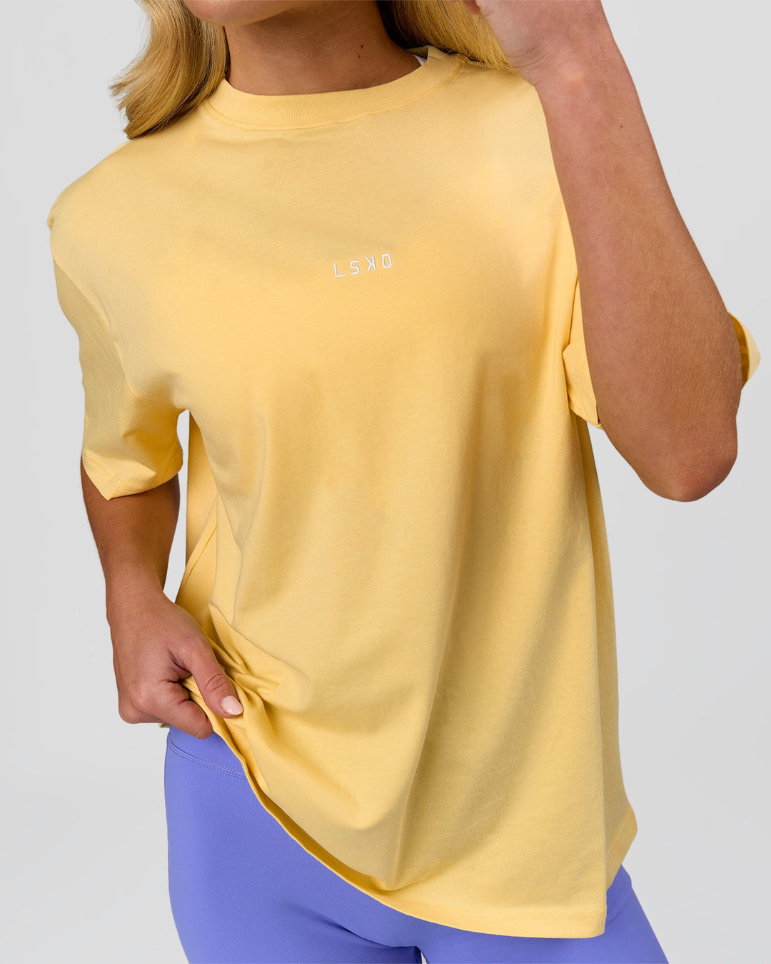 Woman wearing Go-To FLXCotton Oversized Tee - Lemon-White | Model:Issy | Size:XS - view 6