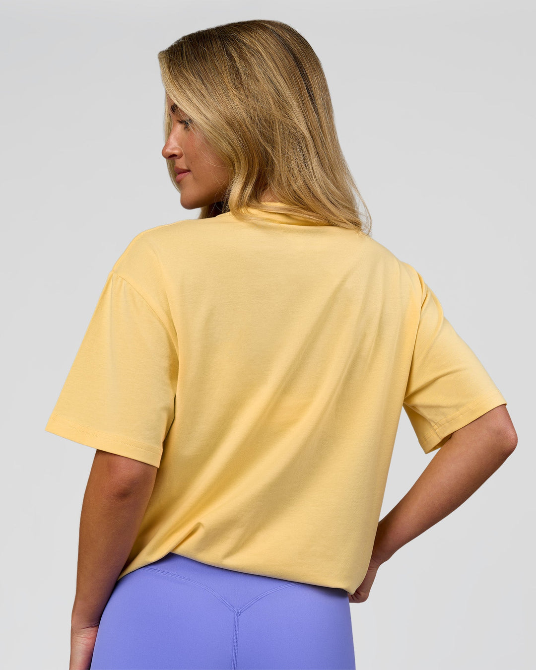 Woman wearing Go-To FLXCotton Oversized Tee - Lemon-White | Model:Issy | Size:XS - view 8