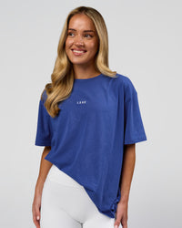 Woman wearing Go-To FLXCotton Oversized Tee - Power Cobalt-White | Model:Issy | Size:XS | Thumbnail Index: 6