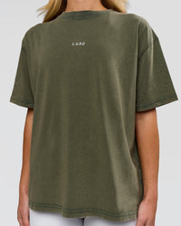 Woman wearing Go-To FLXCotton Oversized Tee - Pure Olive Washed | Model:Issy | Size:XS | Thumbnail Index: 1