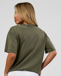 Woman wearing Go-To FLXCotton Oversized Tee - Pure Olive Washed | Model:Issy | Size:XS | Thumbnail Index: 7