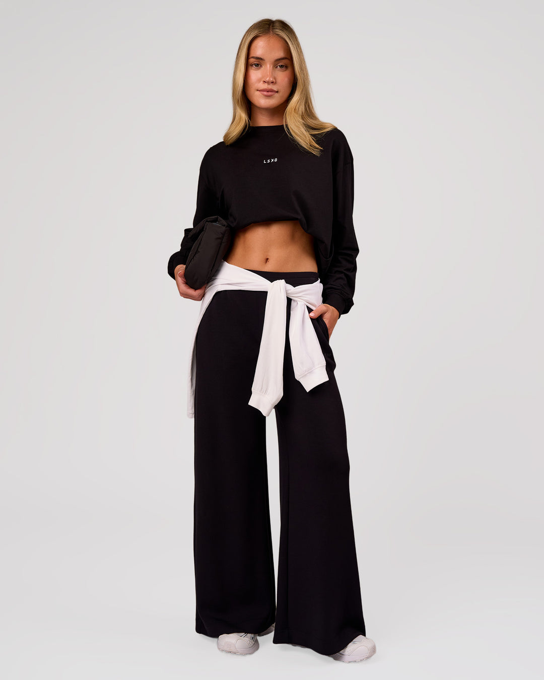 Woman wearing Go-To Long Sleeve FLXCotton Oversized Tee - Black-White | Model:Issy | Size:XS - view 2