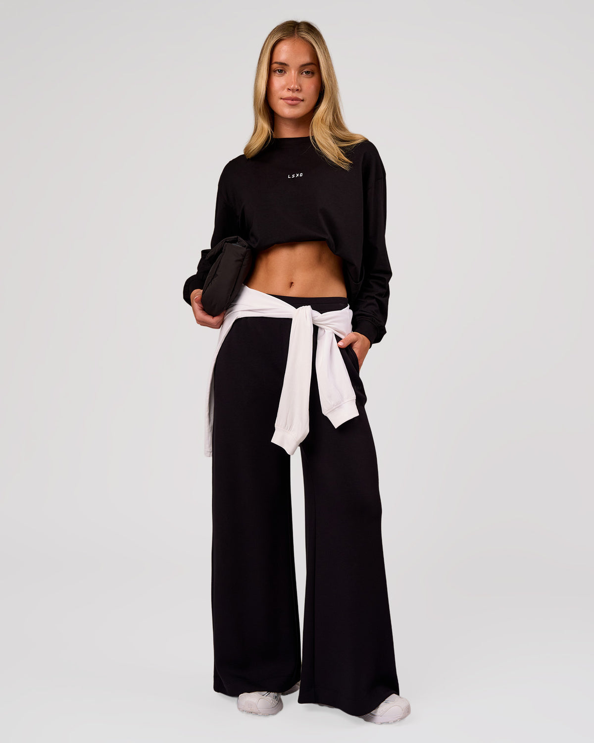 Woman wearing Go-To Long Sleeve FLXCotton Oversized Tee - Black-White | Model:Issy | Size:XS