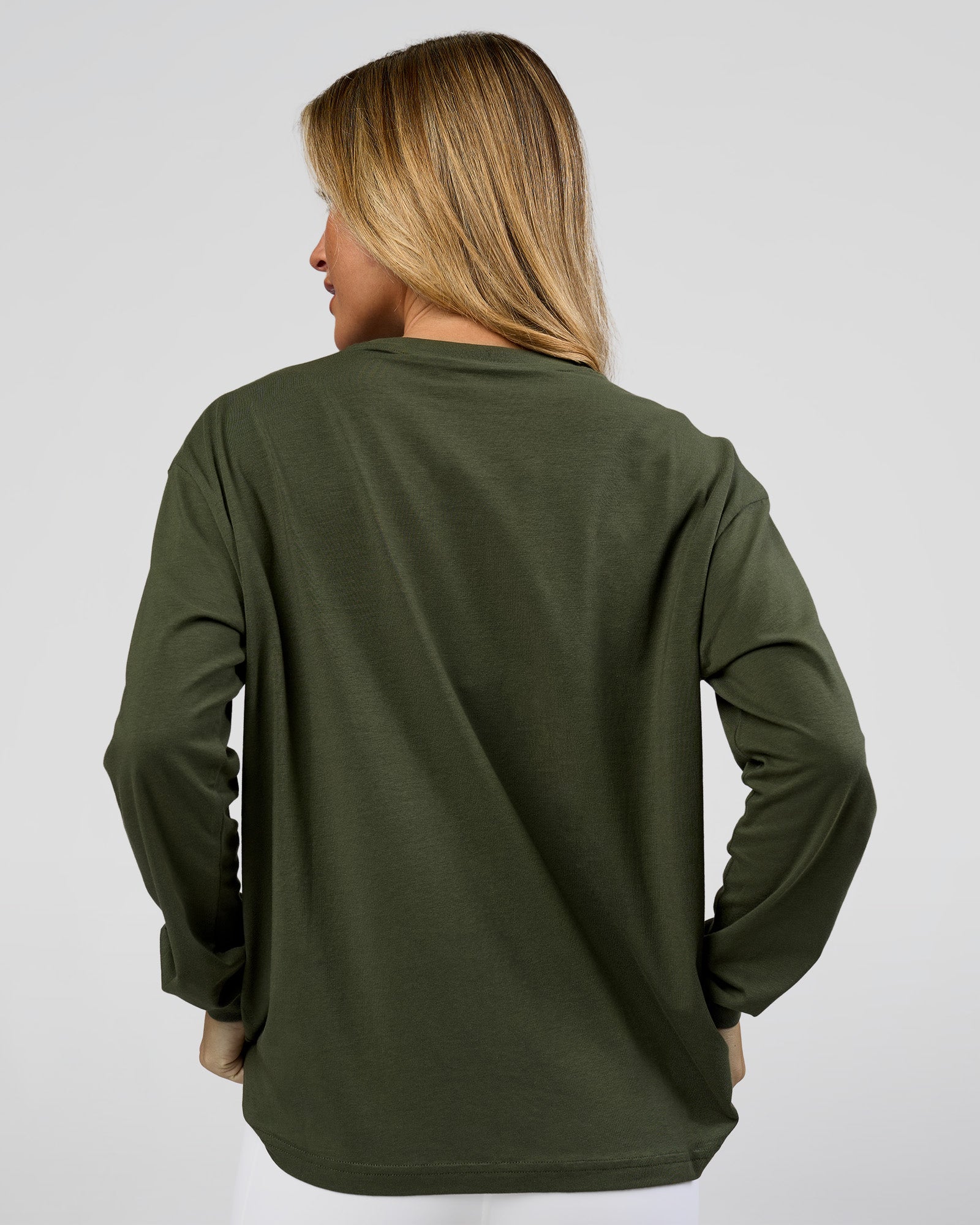 Woman wearing Go-To Long Sleeve FLXCotton Oversized Tee - Pure Olive-White | Model:Issy | Size:XS