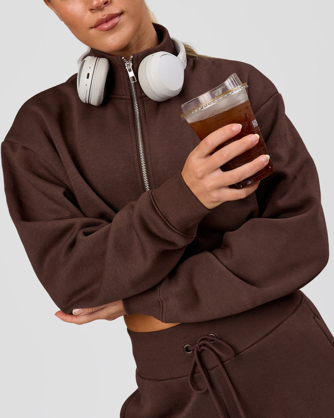 Woman wearing Go-To Oversized Quarter Zip Sweater - Hot Chocolate | Model:Issy | Size:XS