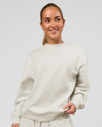 Woman wearing Go-To Oversized Sweater - Silver Marl | Model:Issy | Size:XS | Thumbnail Index: 0