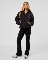 Woman wearing Go-To Puffer Jacket - Black | Model:Issy | Size:XS | Thumbnail Index: 4
