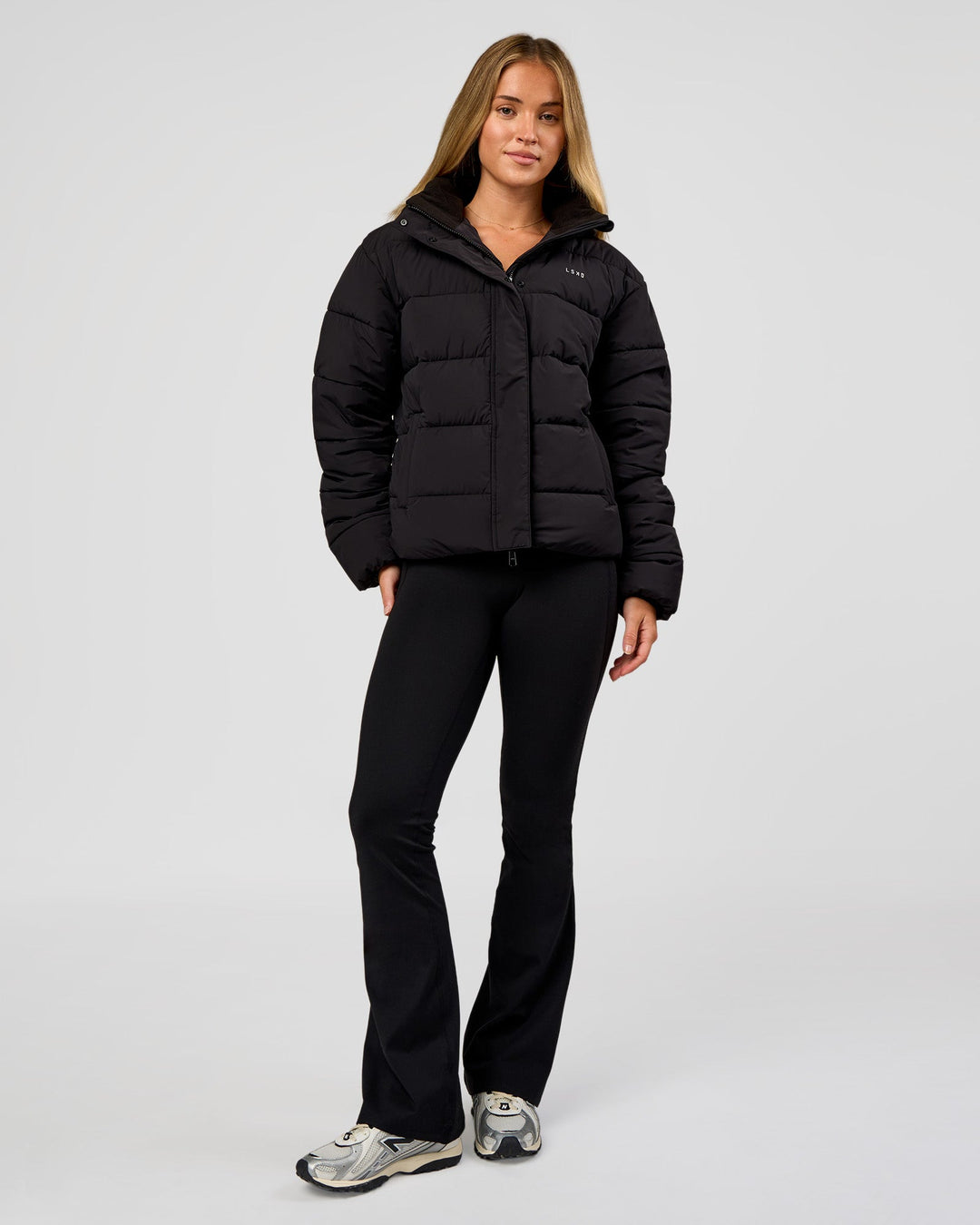 Woman wearing Go-To Puffer Jacket - Black | Model:Issy | Size:XS - view 7