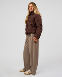 Woman wearing Go-To Puffer Jacket - Hot Chocolate | Model:Issy | Size:XS | Thumbnail Index: 3