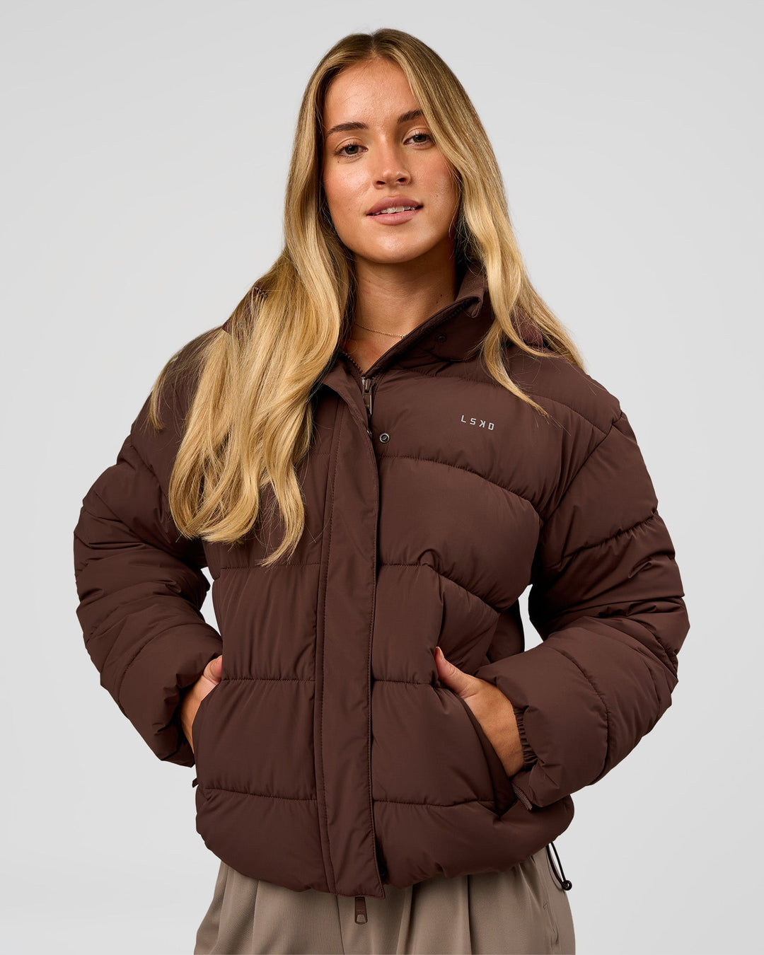Woman wearing Go-To Puffer Jacket - Hot Chocolate | Model:Issy | Size:XS - view 1