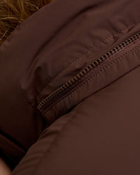 Woman wearing Go-To Puffer Jacket - Hot Chocolate | Model:Issy | Size:XS | Thumbnail Index: 11