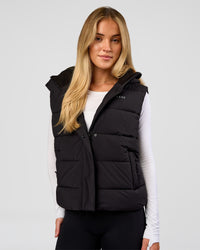 Woman wearing Go-To Puffer Vest - Black | Model:Issy | Size:XS | Thumbnail Index: 0
