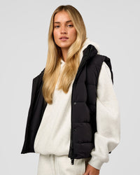 Woman wearing Go-To Puffer Vest - Black | Model:Issy | Size:XS | Thumbnail Index: 7