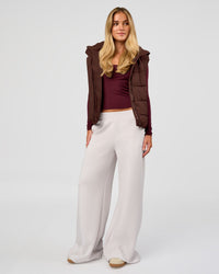 Woman wearing Go-To Puffer Vest - Hot Chocolate | Model:Issy | Size:XS | Thumbnail Index: 3