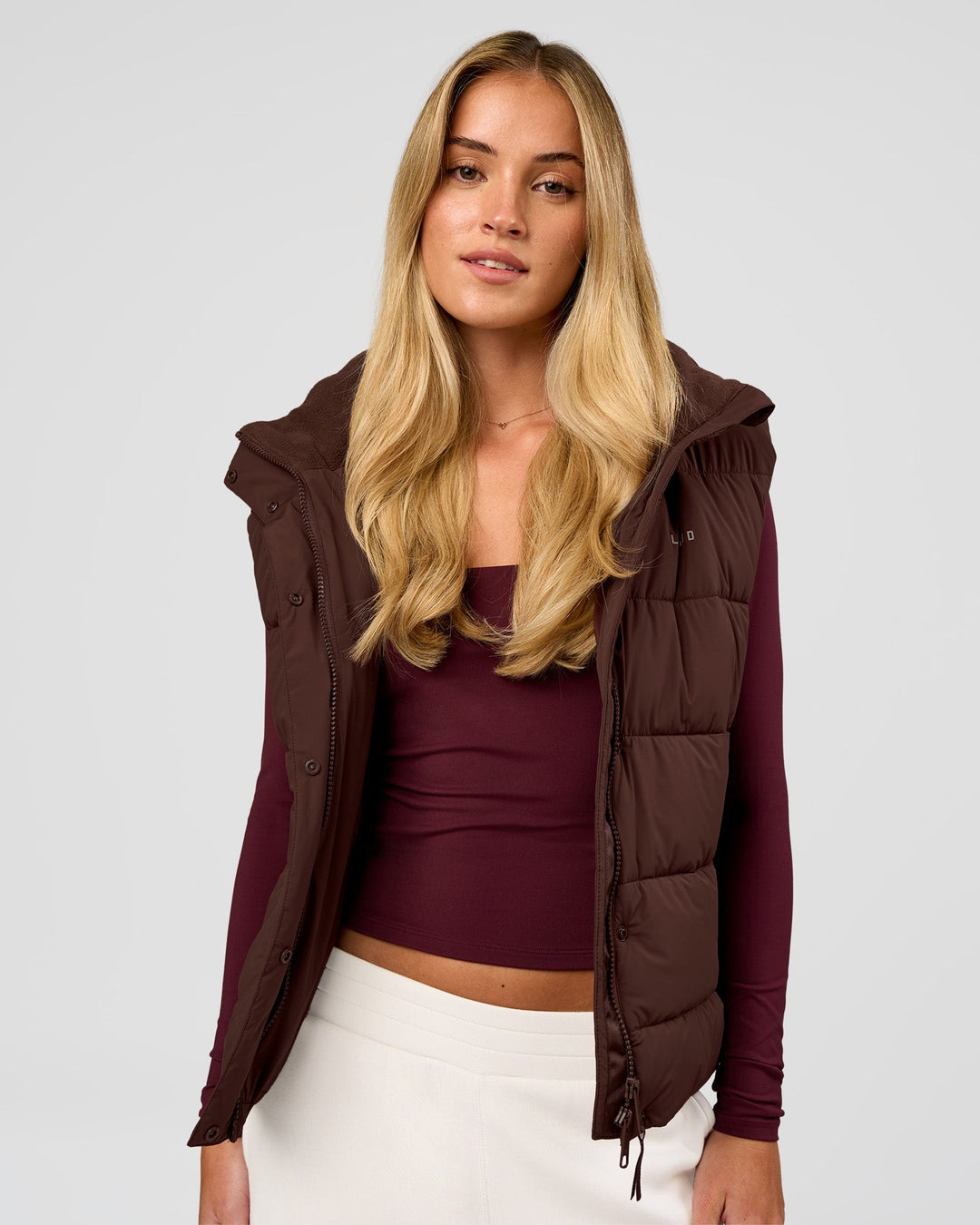 Woman wearing Go-To Puffer Vest - Hot Chocolate | Model:Issy | Size:XS - view 3