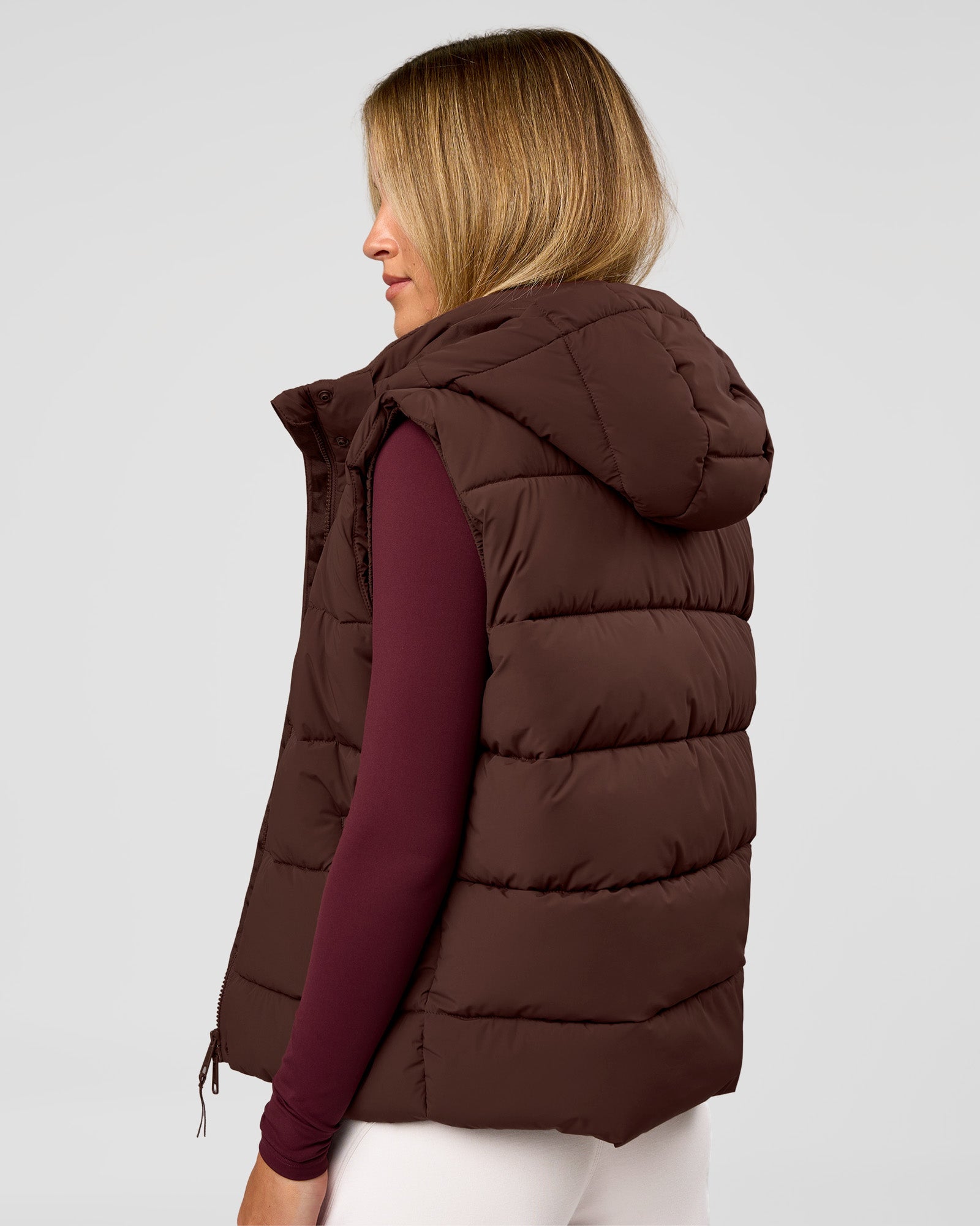 Woman wearing Go-To Puffer Vest - Hot Chocolate | Model:Issy | Size:XS