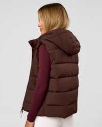 Woman wearing Go-To Puffer Vest - Hot Chocolate | Model:Issy | Size:XS | Thumbnail Index: 1