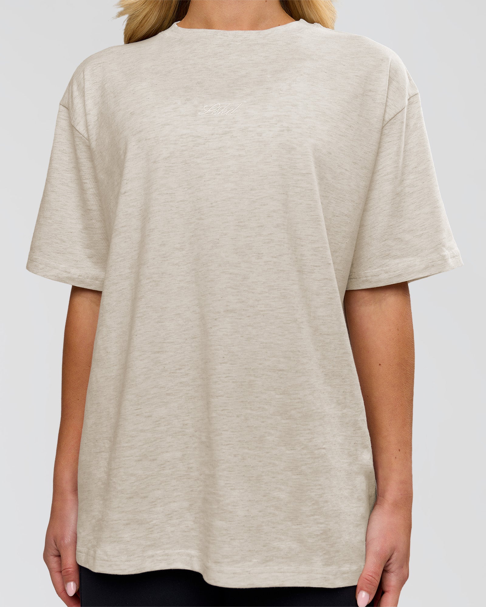 Woman wearing Go-To Script FLXCotton Oversized Tee - Silver Marl-White | Model:Issy | Size:XS