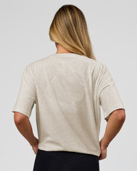 Woman wearing Go-To Script FLXCotton Oversized Tee - Silver Marl-White | Model:Issy | Size:XS | Thumbnail Index: 2