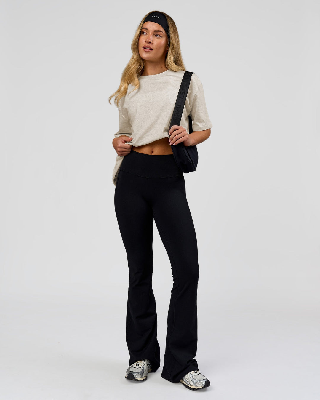 Woman wearing Go-To Script FLXCotton Oversized Tee - Silver Marl-White | Model:Issy | Size:XS - view 4