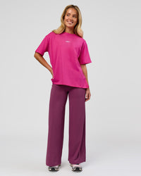 Woman wearing Go-To Script FLXCotton Oversized Tee - Ultra Pink-White | Model:Issy | Size:XS | Thumbnail Index: 2